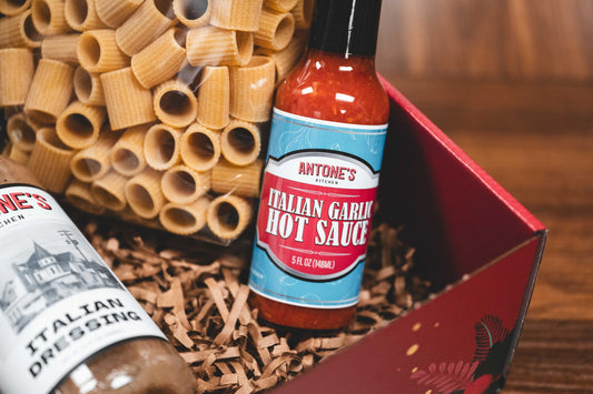 Antone's Kitchen Italian Garlic Hot Sauce bottle in a red gift box
